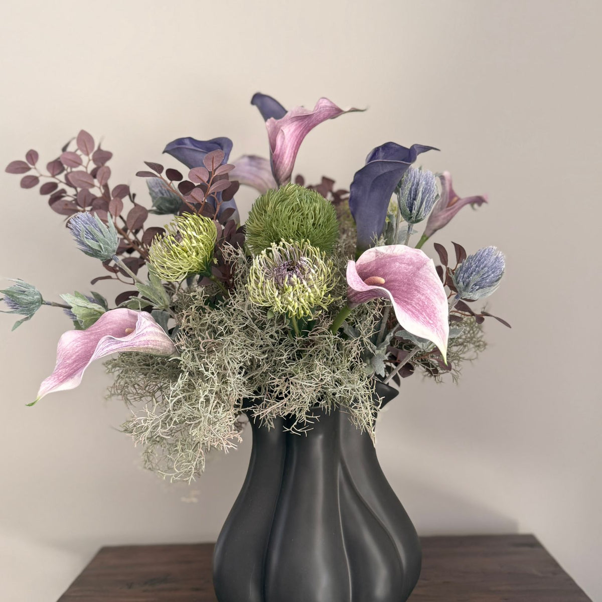Moody Calla Lily & Protea Floral Arrangement